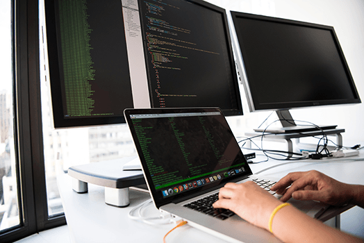 Intermediate level: Human programming on a laptop in a professional setting
